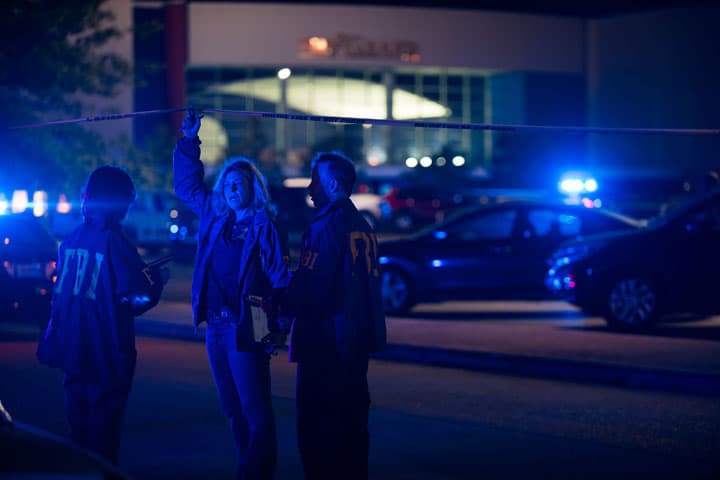 Federal investigators respond to the scene of a shooting at the Grand Theatre on Thursday, July 23, 2015, in Lafayette, La. (AP)