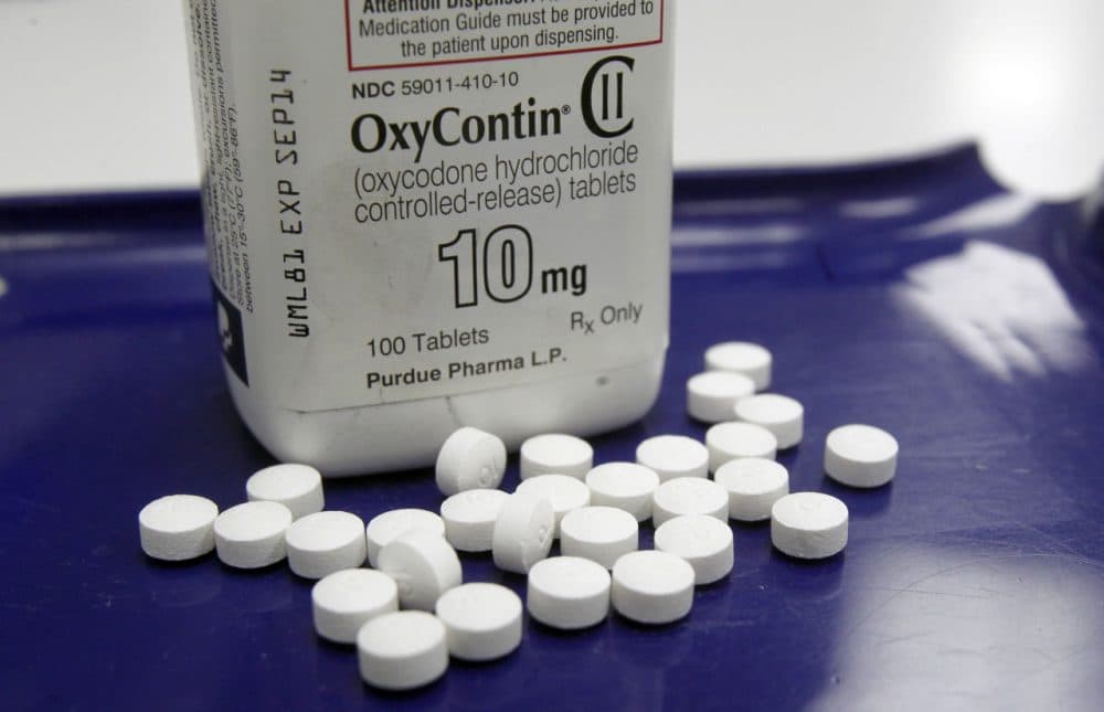 OxyContin pills are arranged at a pharmacy in Montpelier, Vt. in this 2013 file photo. Opioid drugs include OxyContin. (Toby Talbot/AP)