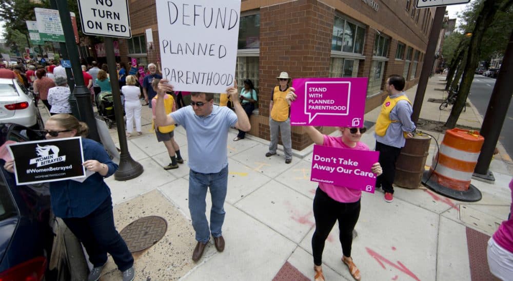 Opponents and supporters of Planned Parenthood demonstrate Tuesday, July 28, 2015, in Philadelphia. (Matt Rourke/AP)