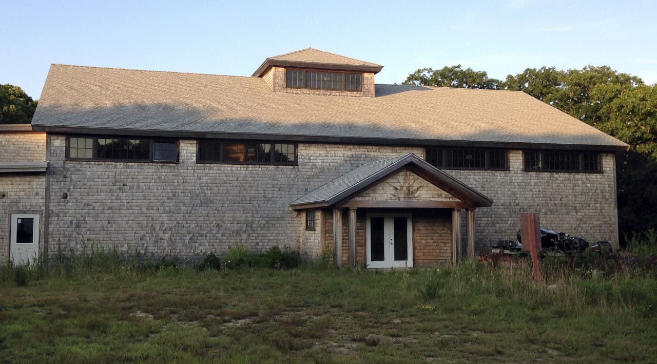 The state and the Aquinnah Wampanoag are asking a federal judge to settle whether the tribe can turn this Martha's Vineyard community center into a gambling house. (Philip Marcelo/AP)