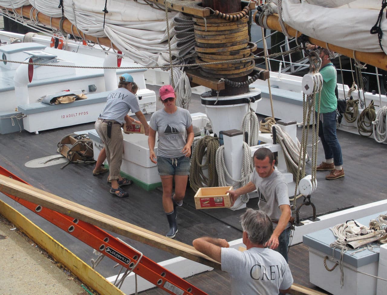 The Adventure teems with workers getting the ship ready to sail. (Tom Porter/MPBN)