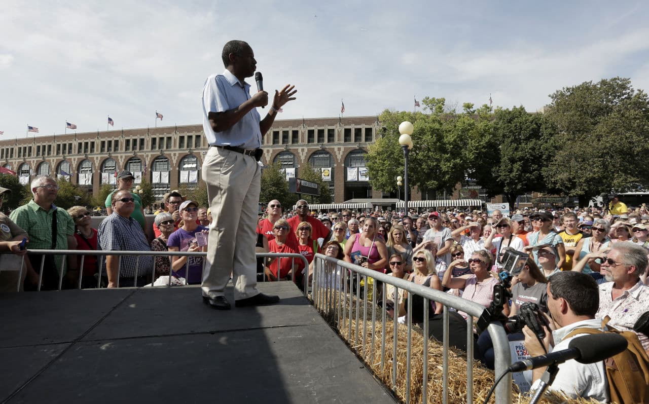 Republican presidential candidate Ben Carson speaks to the crowd at the Iowa State Fair Sunday. (Charlie Riedel/AP)