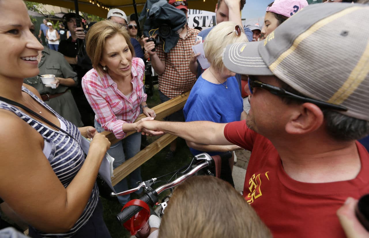 Republican presidential candidate Carly Fiorina greets fairgoers during a visit to the Iowa State Fair Monday. (Charlie Neibergall/AP)