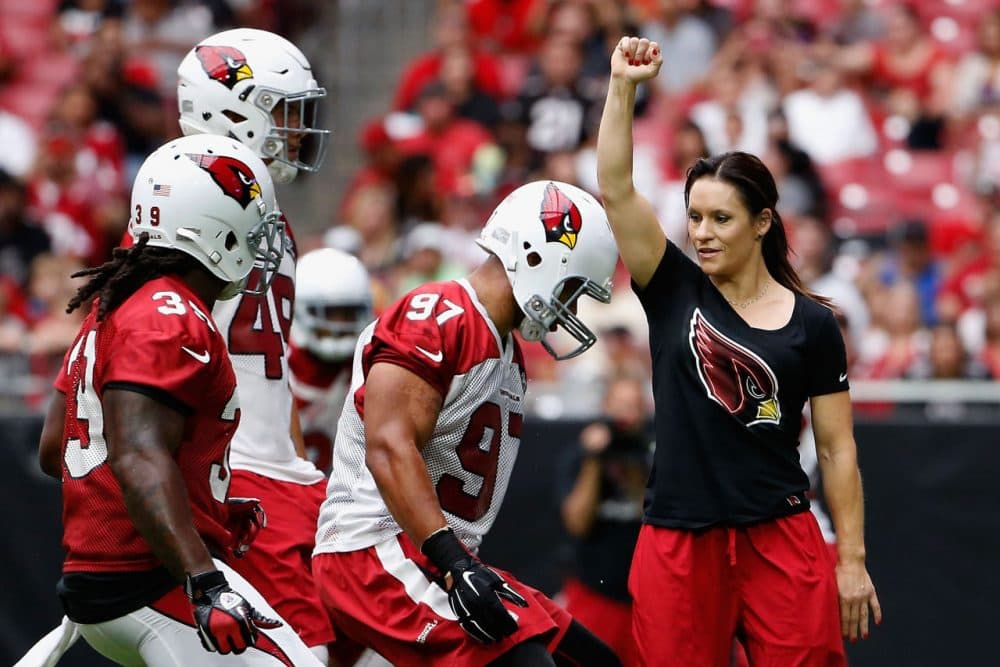 Jen Welter became the first women to coach in the NFL earlier this summer when she was hired as a training camp coaching intern with the Arizona Cardinals. (Christian Petersen/Getty Images)
