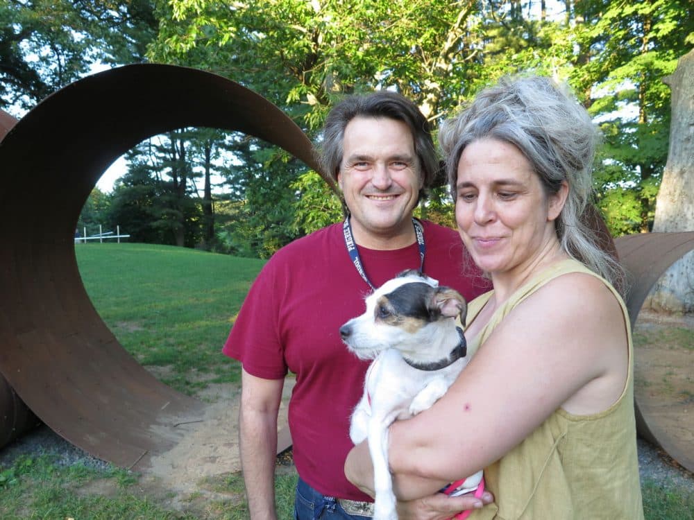 Jason Reis with his wife Karen Krolak went on a special group walk of the deCordova Sculpture Park and Museum with their cultured Jack Russell Terrier mix, &quot;Quacks.&quot; (WBUR/Andrea Shea)