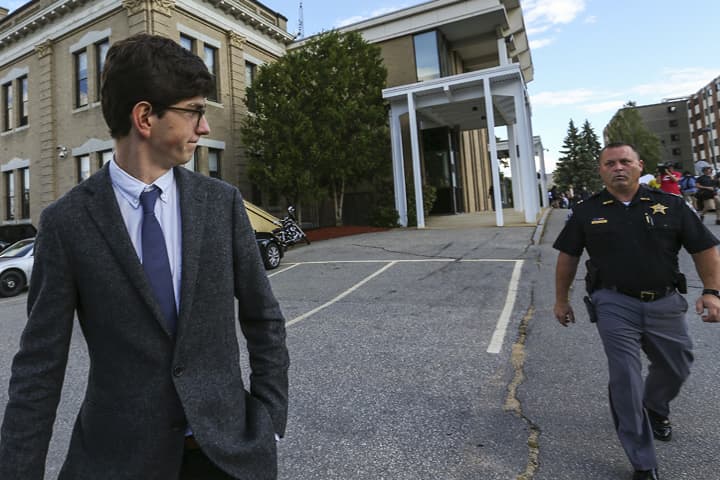 While the jury still deliberates, former St. Paul's School student Owen Labrie, left, leaves the Merrimack Superior Court at the end of day with security in tow Thursday, Aug. 27, 2015, in Concord, N.H.  Labrie was convicted by a jury of several misdemeanors, but ruled not guilty in the most serious felony sexual assault charges. (AP)