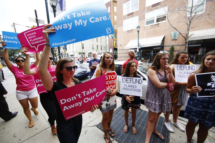 Opponents and supporters of Planned Parenthood demonstrate Tuesday, July 28, 2015, in Philadelphia. Anti-abortion activists are calling for an end to government funding for the nonprofit reproductive services organization.  (AP)