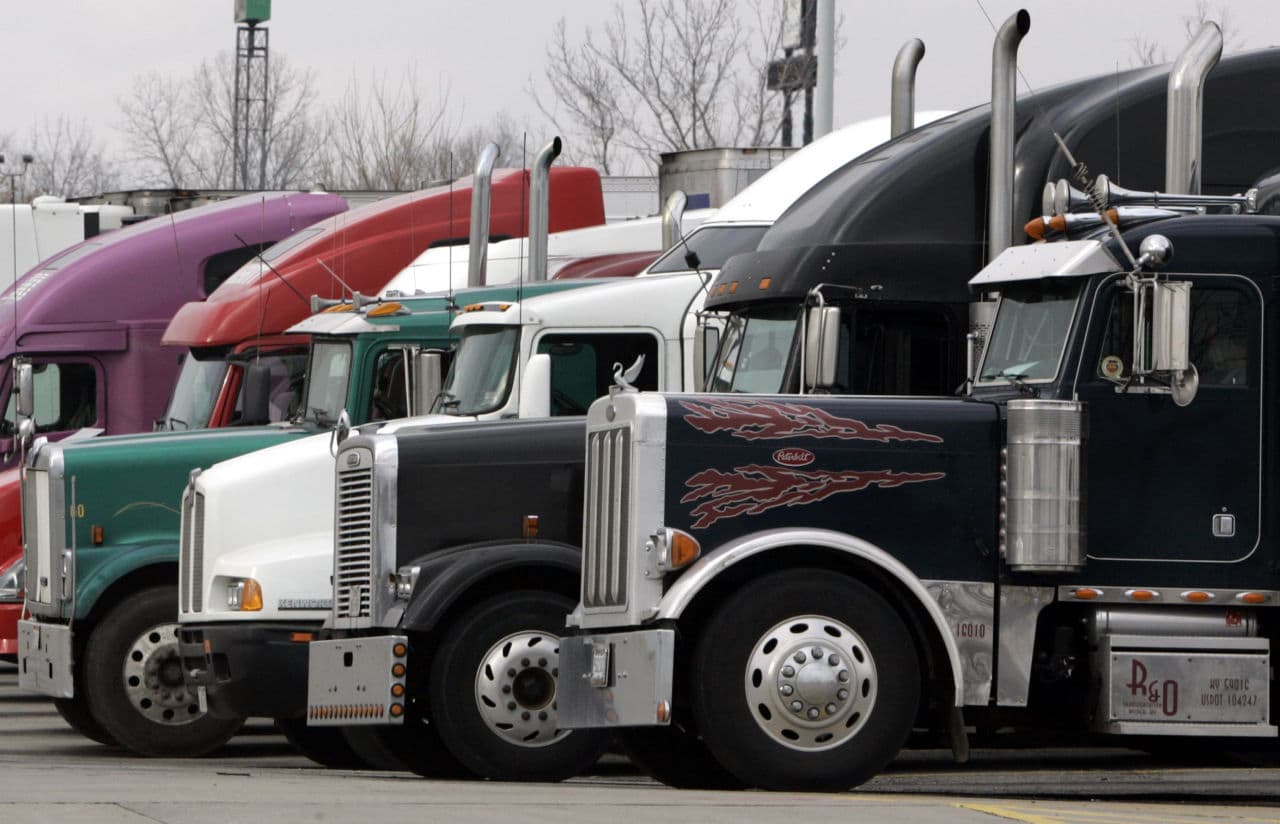 Trucks park at a truck stop, Monday, Jan. 30, 2006, in Franklin, Ohio. (Al Behrman/AP)