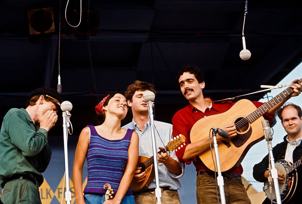 The Jim Kweskin Jug Band performs at the 1964 Newport Folk Festival. From left: Mel Lyman, Maria Muldaur, Geoff Muldaur, Jim Kweskin and Bill Keith. (Photo courtesy Jim Kweskin/Joe Alper)