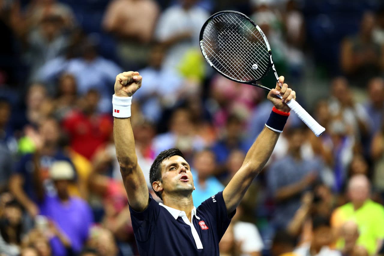 World No. 1 Novak Djokovic moves on to the quarter finals. (Clive Brunskill/Getty Images)