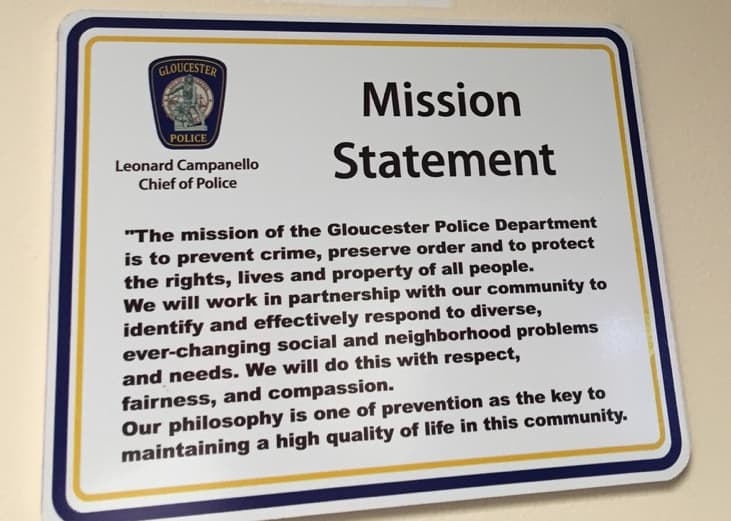 This mission statement hangs at the Gloucester Police Department. (Robin Young)