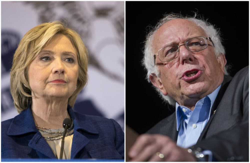WBUR's poll of the likely voters in the New Hampshire Democratic presidential primary finds Bernie Sanders, right, leading Hillary Clinton. (Scott Morgan and Cliff Owen/AP)