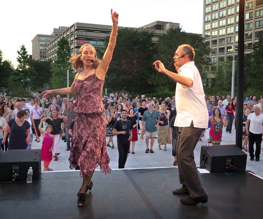 Let’s Dance Boston instructors Eileen Herman-Haase and Raul Nieves. (Andrea Shea/WBUR)