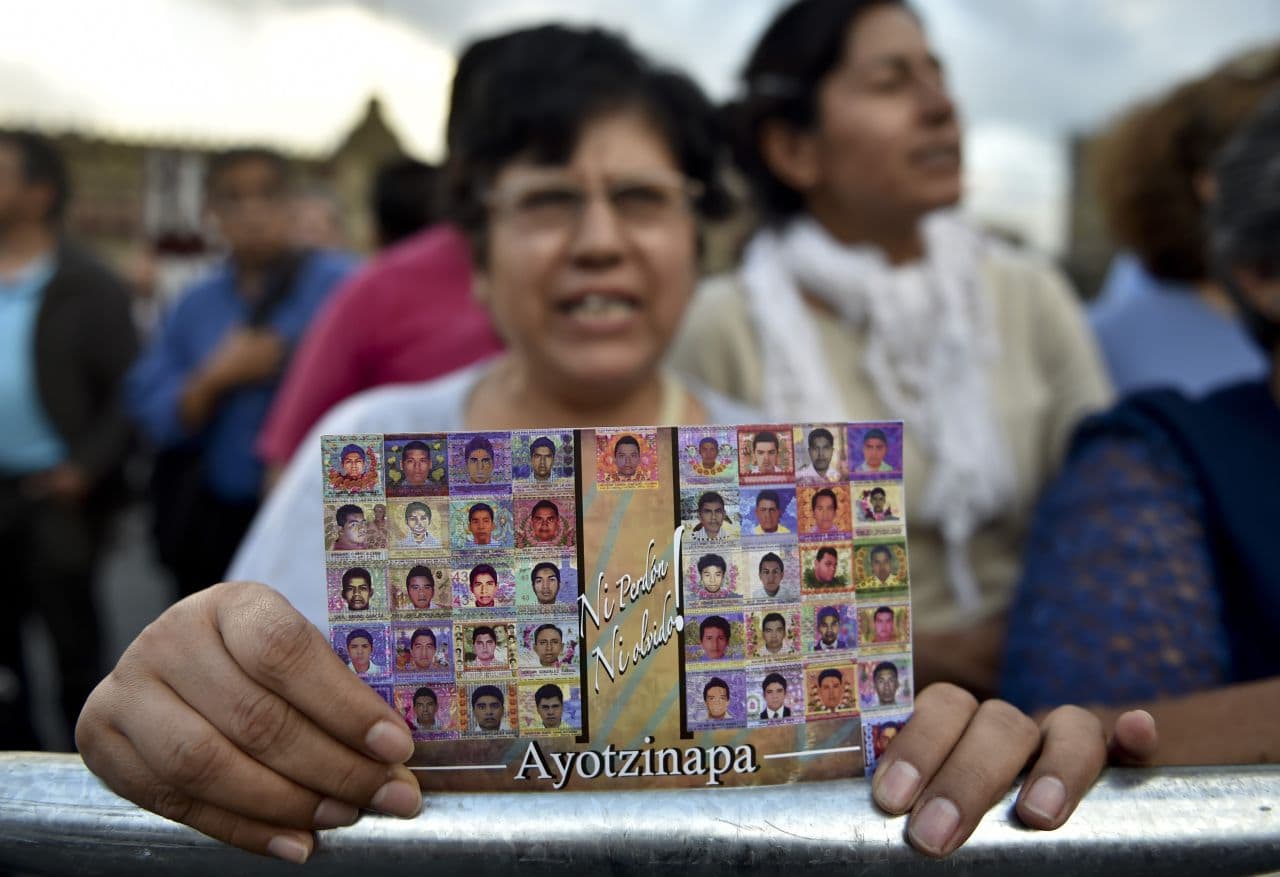 People gathering in Mexico City show their support to parents, relatives and friends of the 43 missing students from a rural teachers college from Ayotzinapa. (Yuri Cortez/AFP/Getty Images)