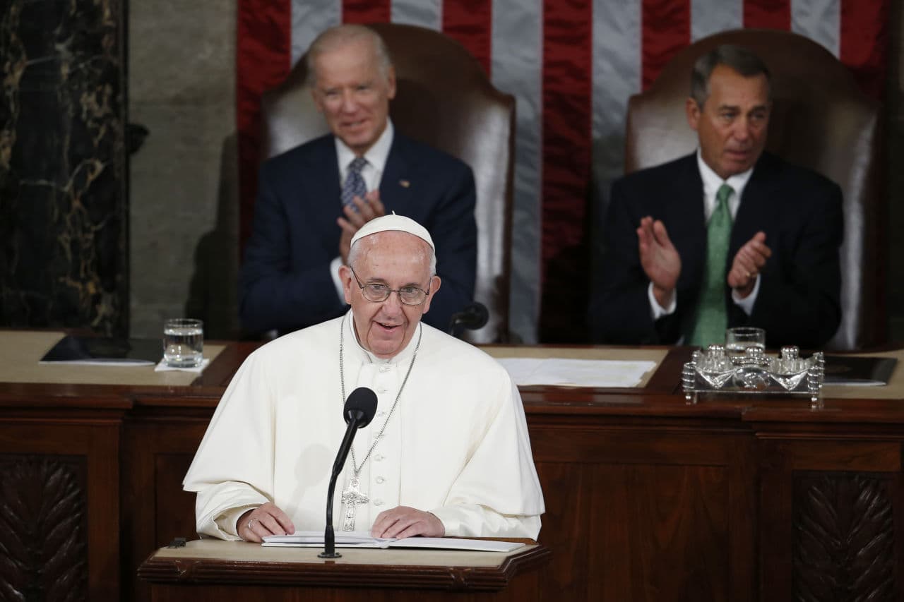 Pope Francis addresses a joint meeting of Congress on Capitol Hill in Washington, Thursday, Sept. 24, 2015, making history as the first pontiff to do so. Listening behind the pope are Vice President Joe Biden and House Speaker John Boehner of Ohio. (Carolyn Kaster/AP)
