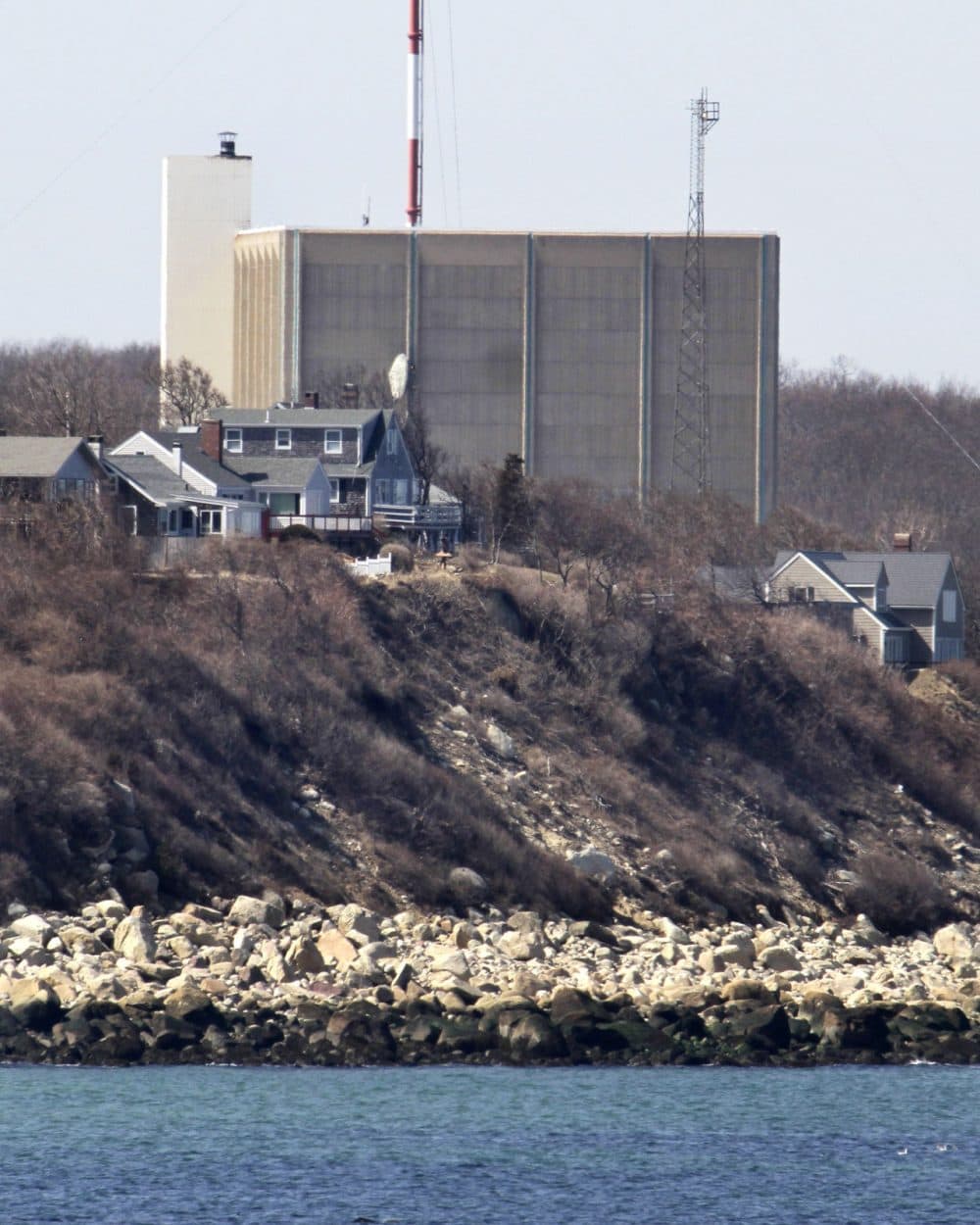 A tower at Pilgrim Nuclear Power Station in Plymouth is seen near the coast of Cape Cod Bay in 2011. (Steven Senne/AP)