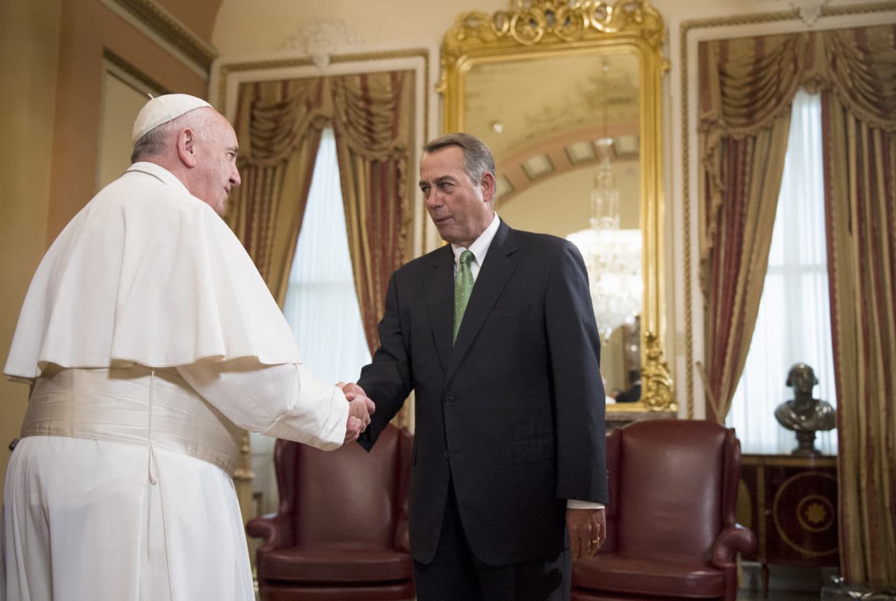 House Speaker John Boehner of Ohio greets Pope Francis on Capitol Hill Thursday, one day before announcing his resignation. (Bill Clark/Roll Call/Pool)