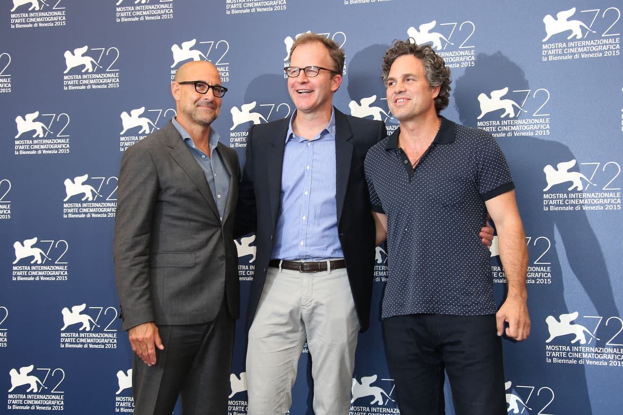 Actor Stanley Tucci, director Thomas McCarthy and actor Mark Ruffalo pose for photographers at the Venice Film Festival Thursday. (Joel Ryan/Invision/AP)