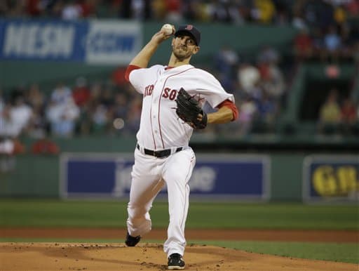 Sox starter Rick Porcello delivers a pitch against the Yankees in the first inning Tuesday at Fenway Park, in Boston. (Steven Senne/AP)