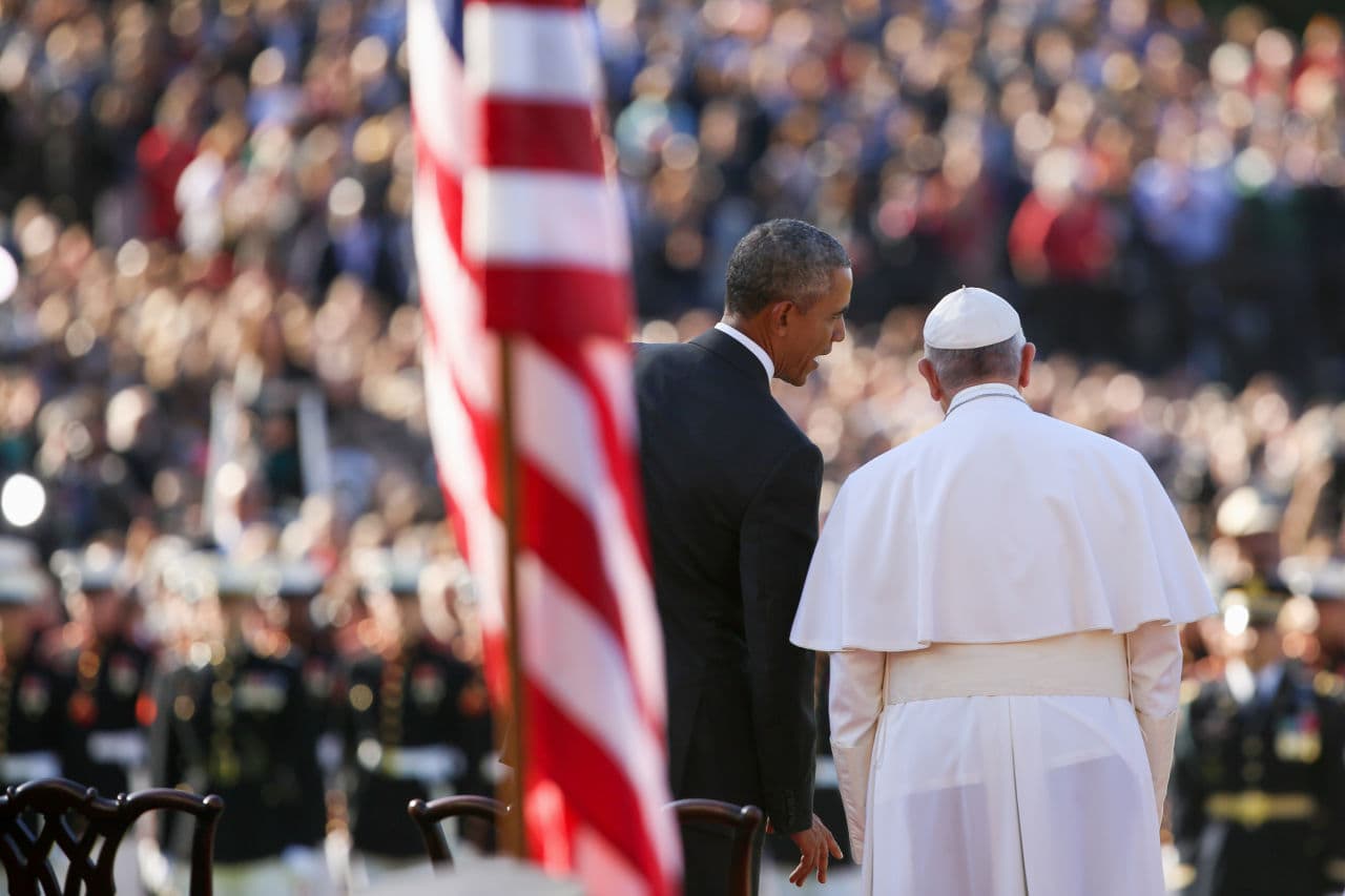 President Obama and Pope Francis stand together on stage during a state arrival ceremony for the pope. (Andrew Harnik/AP)