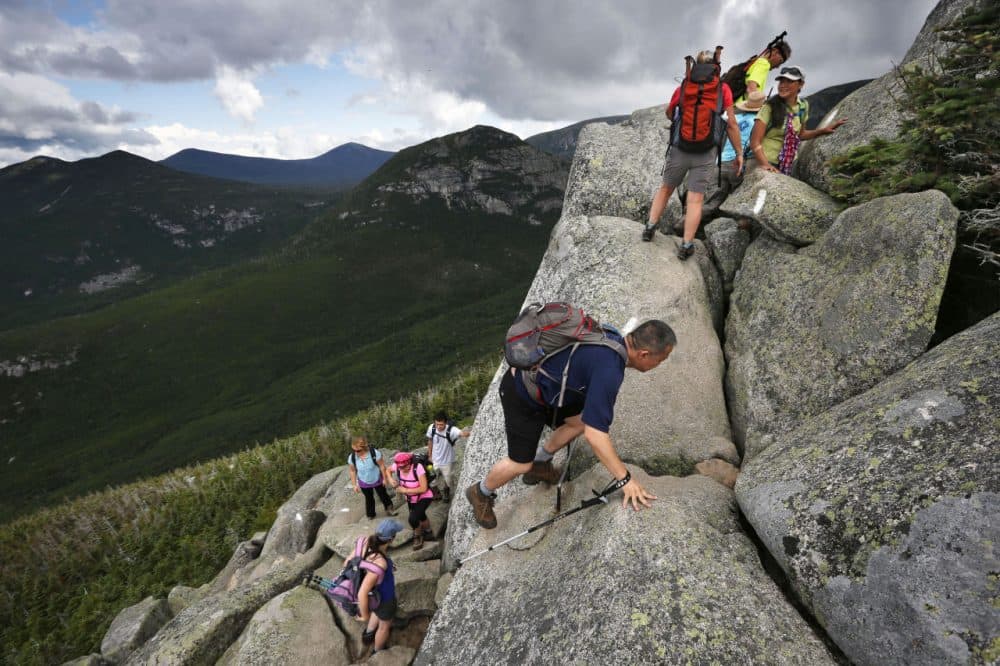 Day-hikers scramble over rocky boulders on the Appalachian Trail below the summit of Mt. Katahdin in Baxter State Park. (Robert F. Bukaty/AP)