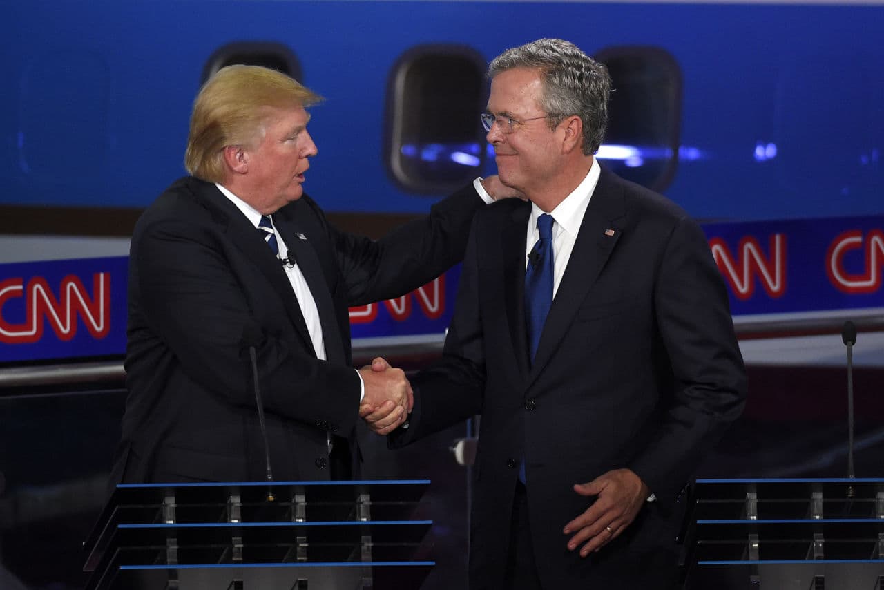 Republican presidential candidate Donald Trump, left, and former Florida Gov. Jeb Bush shake hands after the CNN Republican presidential debate at the Ronald Reagan Presidential Library and Museum, Wednesday, Sept. 16, 2015, in Simi Valley, Calif. (AP)