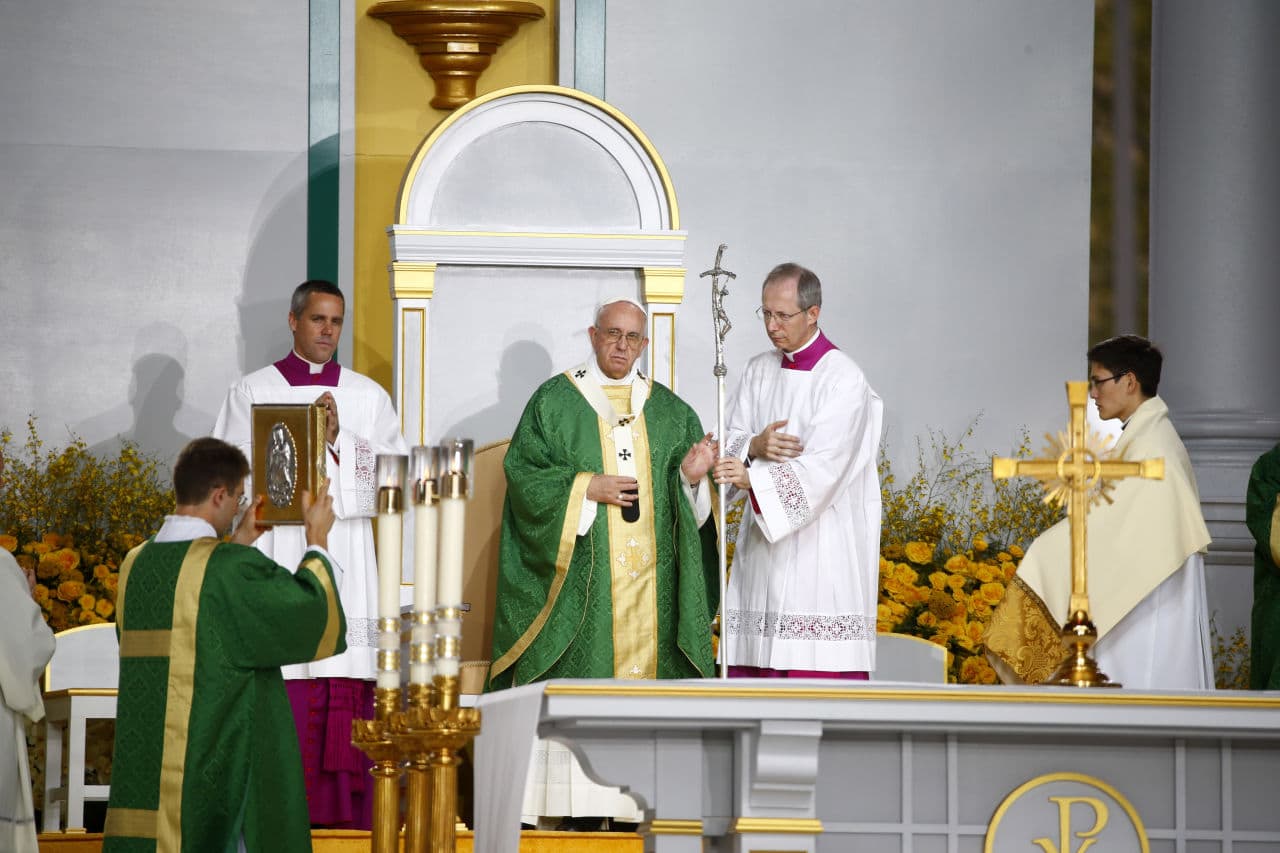 Pope Francis celebrates his final Mass of his visit to the United States at the Festival of Families on Benjamin Franklin Parkway in Philadelphia on Sunday. (Tony Gentile/Pool Photo via AP)