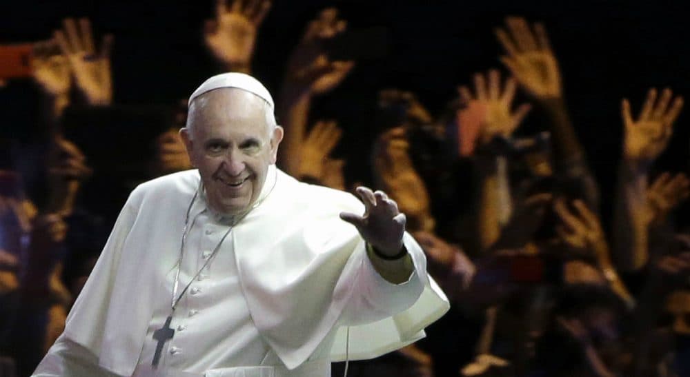 Eileen McNamara: The internal debates of the Catholic Church might be fascinating to Catholics, but why are they assumed to be of compelling interest to everyone else? In this photo, Pope Francis waves to the crowd during a parade Saturday, Sept. 26, 2015, in Philadelphia. (Matt Rourke/ AP)