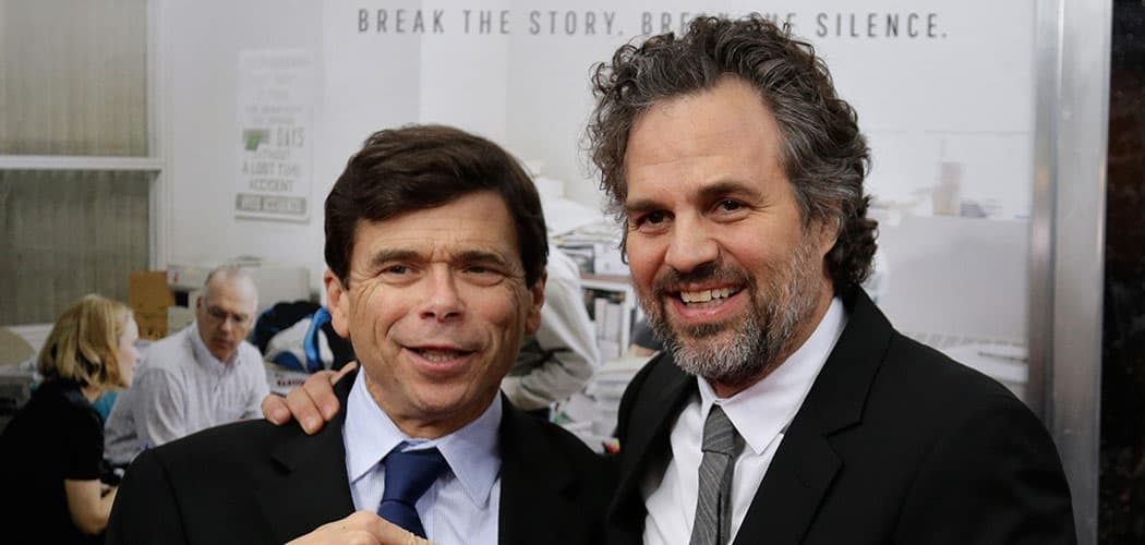 Boston Globe reporter Michael Rezendes, left, stands for a photo with actor Mark Ruffalo, who plays Rezendes in the film &quot;Spotlight,&quot; as they attend the Boston-area premiere of the movie Wednesday at the Coolidge Corner Theatre in Brookline. The film tells the story of how The Boston Globe reported on the clergy sex abuse scandal. (Steven Senne/AP)