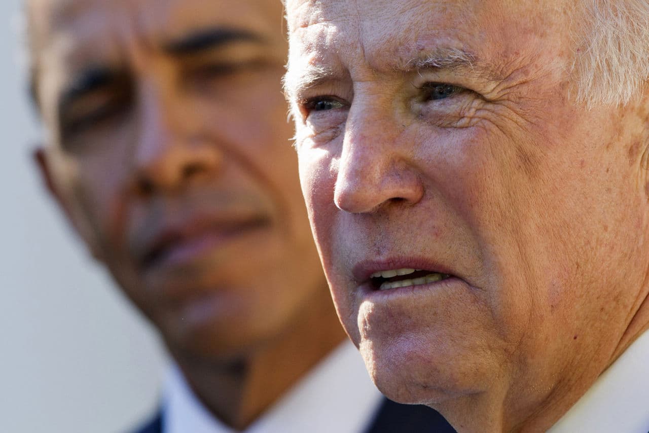 President Barack Obama listens as Vice President Joe Biden speaks in the Rose Garden of the White House in Washington, Wednesday, Oct. 21, 2015, to announce that he will not run for the presidential nomination. (Jacquelyn Martin/AP)