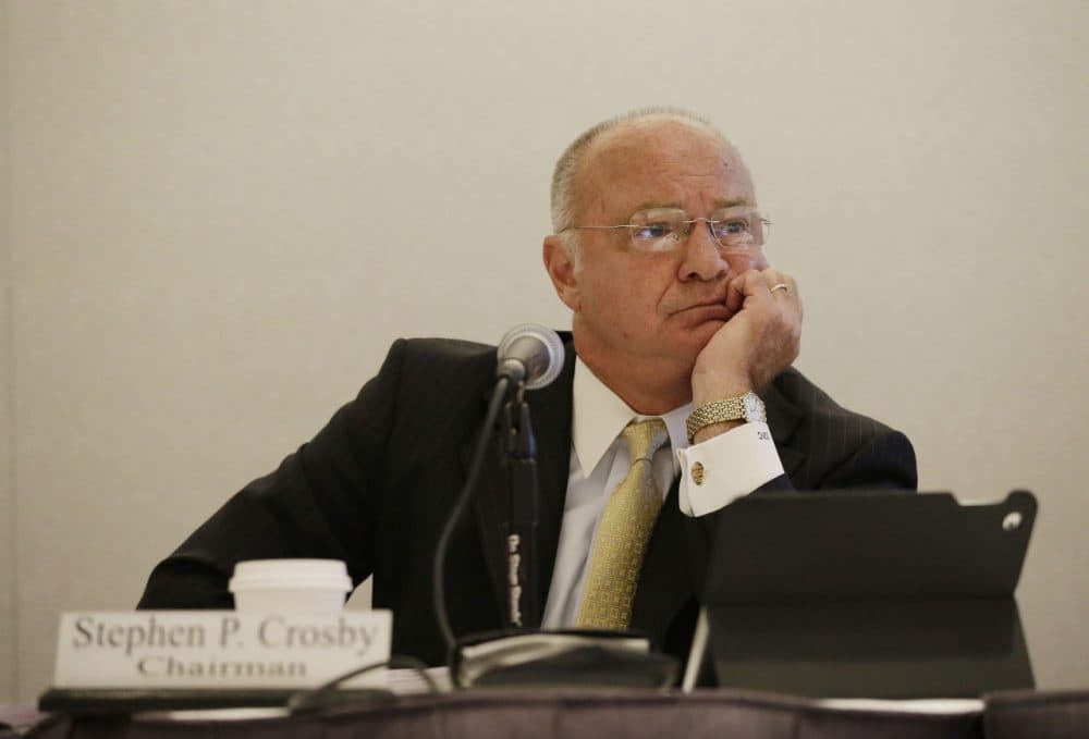 Massachusetts Gambling Commission Chairman Stephen Crosby listens to testimony during a gambling commission meeting. (Stephan Savoia/AP)
