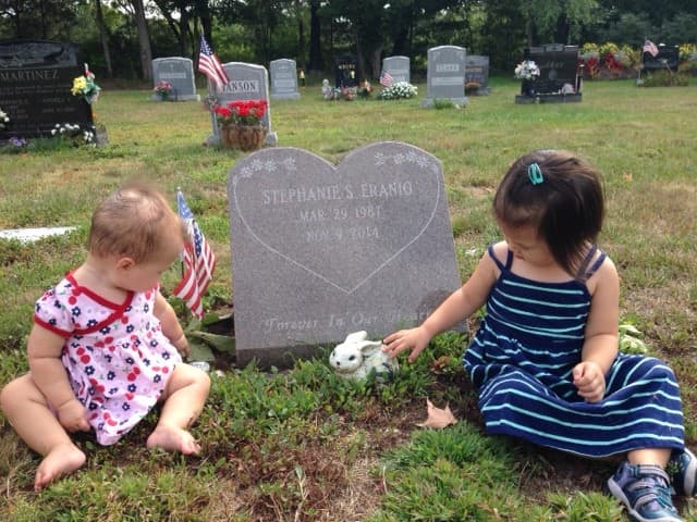 Stephanie Eranio's nieces at her headstone. (Courtesy the Eranio family)