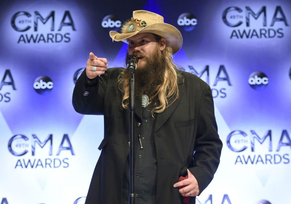 Chris Stapleton, winner of the awards for new artist of the year, album of the year for "Traveller," and male vocalist of the year, participates in an interview in the press room at the 49th annual CMA Awards at the Bridgestone Arena on Wednesday, Nov. 4, 2015, in Nashville, Tenn. (Evan Agostini/Invision/AP)