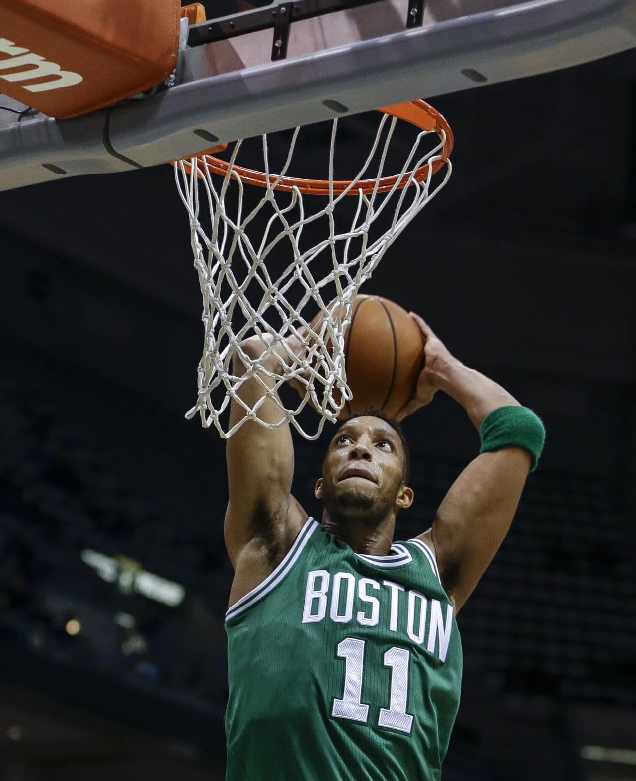 Boston Celtics' Evan Turner prepares to dunk against the Milwaukee Bucks in yesterday's game. (Tom Lynn/AP)
