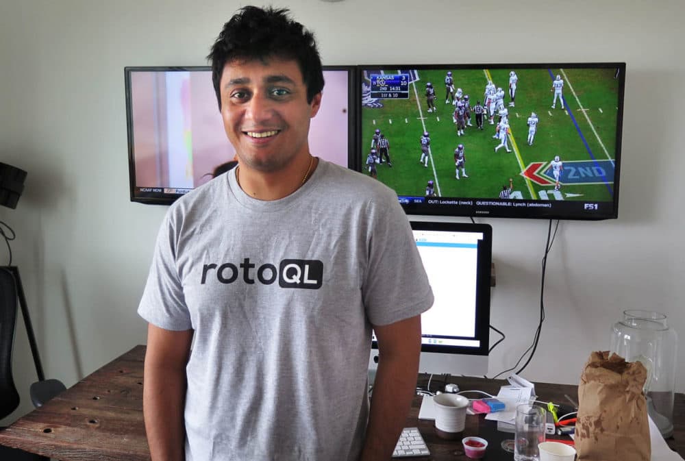 Saahil Sud stands in his apartment in downtown Boston before getting back to work at his full-time job playing daily fantasy sports. (Curt Nickisch/WBUR)