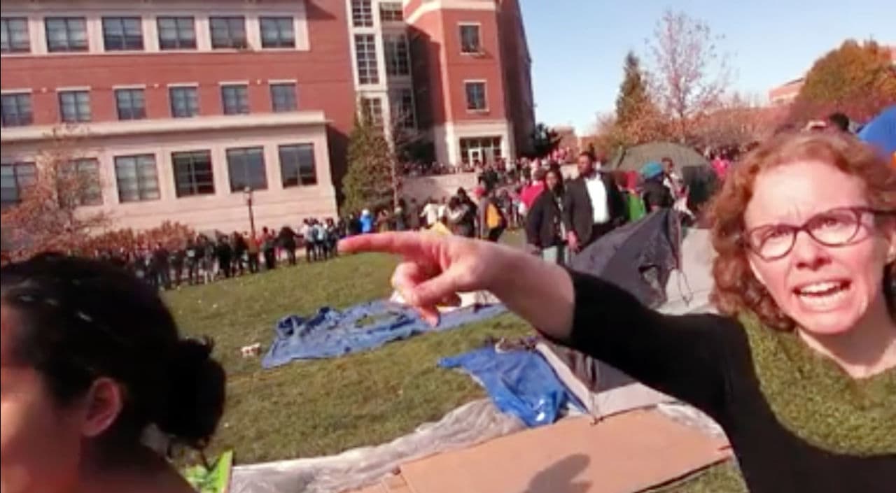 In this Nov. 9, 2015 screen grab, Melissa Click, an assistant professor in Missouri's communications department, is seen confronting student Mark Schierbecker. When he refused to leave, Click calls for "muscle" to help remove him from the protest area. (Mark Schierbecker/ AP)