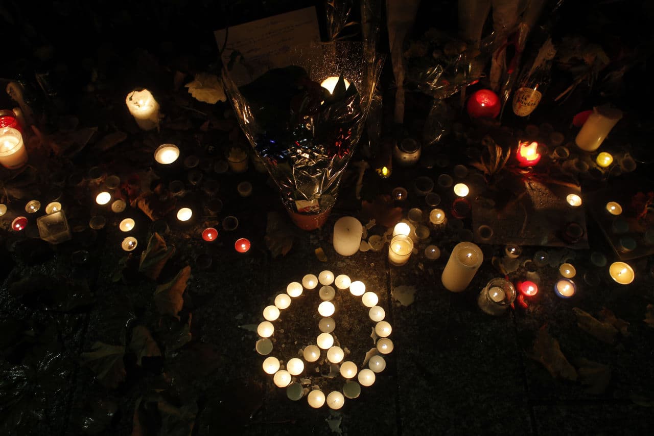 Candles are set in memory to the victims outside the Bataclan concert hall in Paris, Tuesday, Nov. 17, 2015. (Christophe Ena/AP)