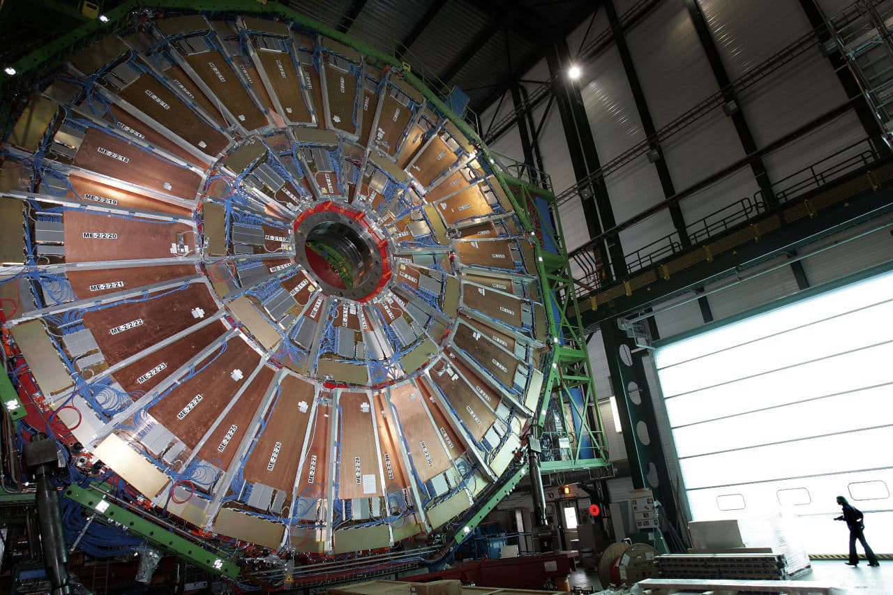 This file picture taken on March 22, 2007 shows a woman walking near the world's largest superconducting solenoid magnet (CMS), at the European Organization for Nuclear Research (CERN)'s Large Hadron Collider (LHC) particle accelerator in Geneva. (Fabrice Coffrini/AFP/Getty Images)