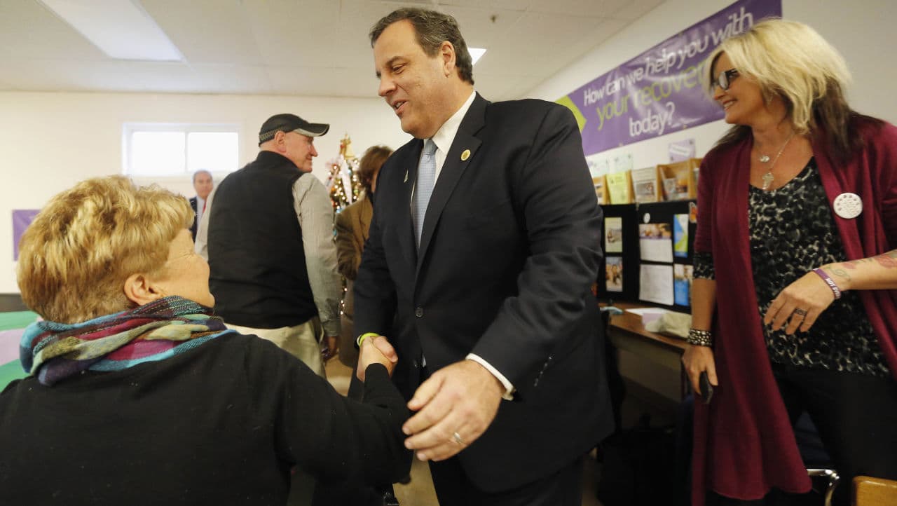 Chris Christie's campaign knows he needs to do well in N.H. if wants a chance at winning the Republican nomination, and they're hoping a new key endorsement will help energize voters. Pictured here, Christie shakes hands as he arrives at a round table discussion in Manchester on Tuesday. (Jim Cole/AP)