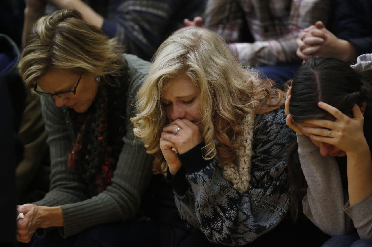People attend a vigil held on University of Colorado-Colorado Springs' campus for those killed in Friday's deadly shooting at a Planned Parenthood clinic Saturday, Nov. 28, 2015, in Colorado Springs, Colo. (David Zalubowski/AP)