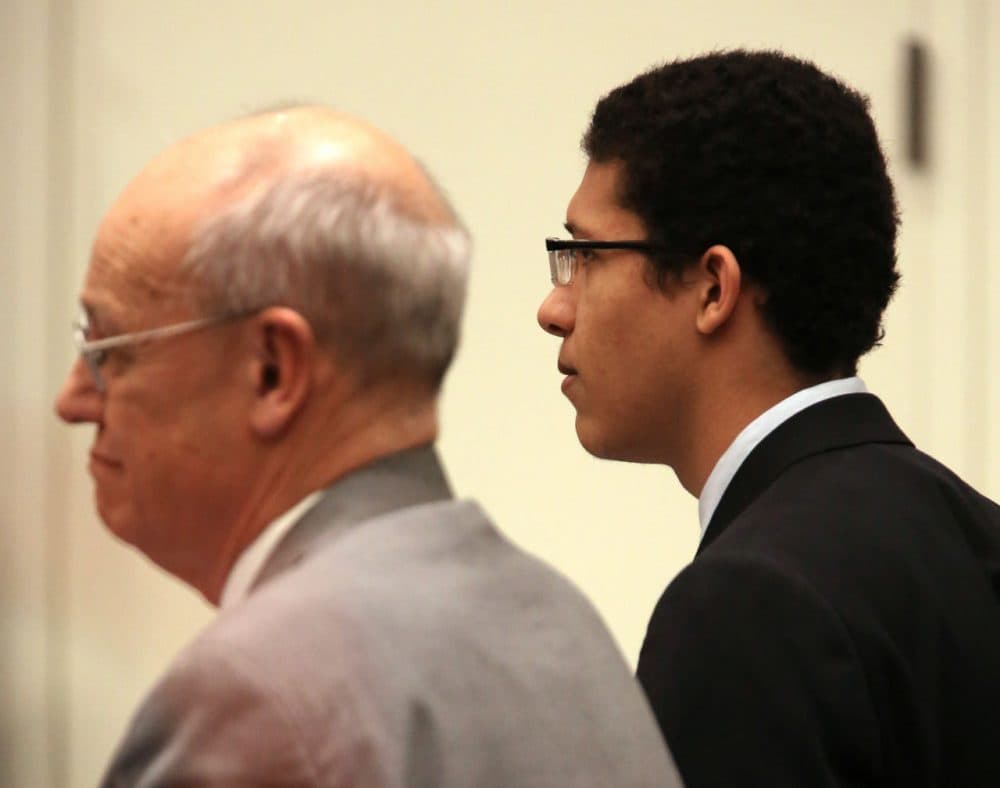 Philip Chism, rights, stares straight ahead beside defense attorney John Osler as the jury reads the verdict in his trial at Salem Superior Court Tuesday. (Ken Yuszkus/The Eagle Tribune via AP/Pool)
