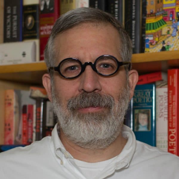 Headshot of Greg Peverill-Conti