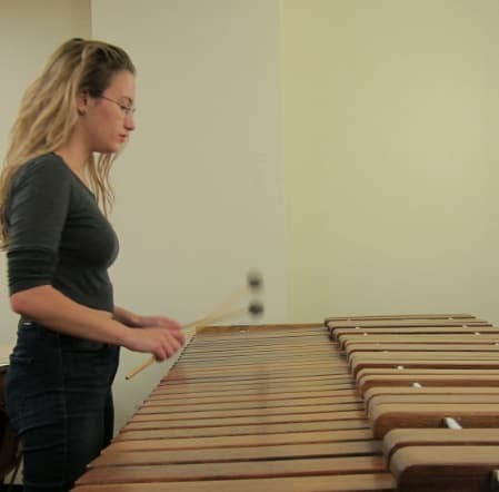 Boston University senior Caitlin Cawley practices on the marimba (Photo: Ian Coss/WBUR)