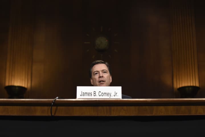 FBI Director James Comey testifies on Capitol Hill in Washington, Wednesday, Dec. 9, 2015, before the Senate Judiciary Committee. Comey said the two San Bernardino shooters were radicalized at least two years ago and had discussed jihad and martyrdom as early as 2013. (AP Photo/Susan Walsh)