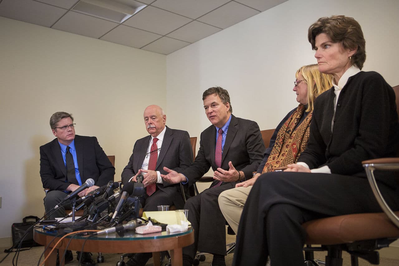 Attorney Eric MacLeish, center, answers questions from the media about the sexual abuse scandal at St. George's. From right to left: Harry Groome, Attorney Carmen Durso, MacLeish, Katie Wales and Anne Scott. (Jesse Costa/WBUR)