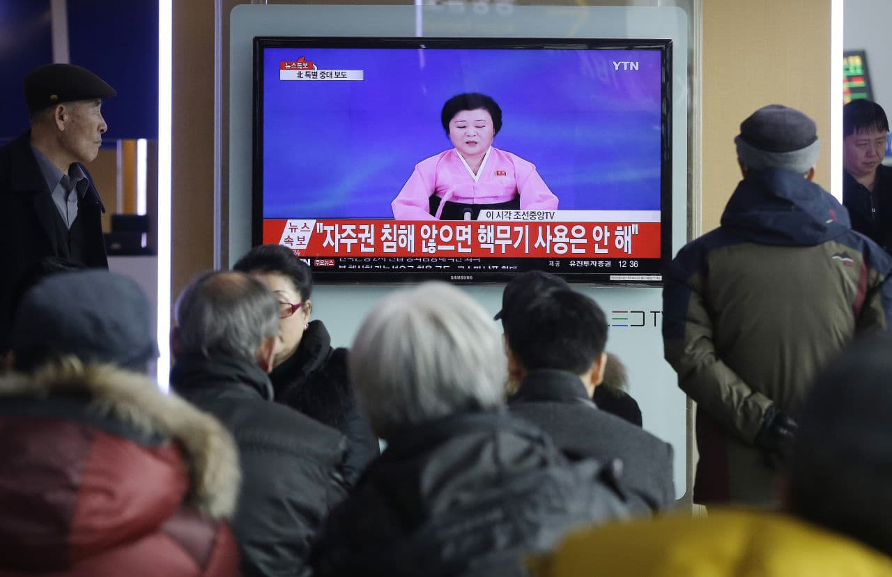 People watch a TV news program showing North Korea's announcement, at the Seoul Railway Station in Seoul, South Korea, Wednesday, Jan. 6, 2016. North Korea said Wednesday it had conducted a hydrogen bomb test, a defiant and surprising move that, if confirmed, would put Pyongyang a big step closer toward improving its still-limited nuclear arsenal. The letters read "Will not use nuclear weapon if autonomy secured." (Ahn Young-joon/AP)