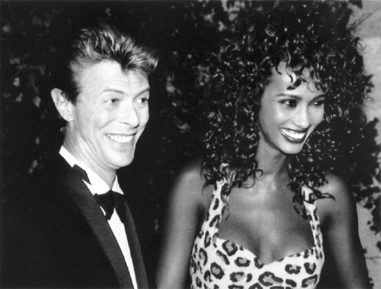 David Bowie is seen with Iman smiling in 1991. The couple married in Lausanne on April 24, 1992. (AP)