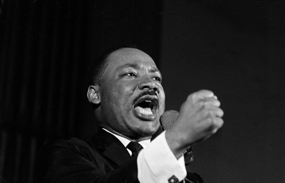 Dr. Martin Luther King Jr. shakes his fist during a speech in Selma, Ala., Feb. 12, 1965. (Horace Cort/AP)