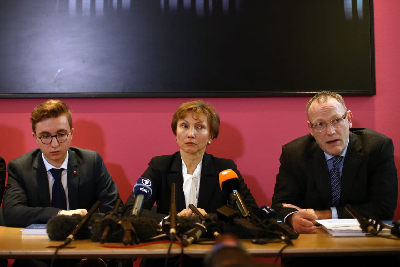 Marina Litvinenko (center) and her son Anatoly (left) listen as their lawyer, Ben Emmerson speaks during a press conference after receiving the results of the inquiry into the death of Marina's husband Alexander Litvinenko, on January 21, 2016 in London, England. Former KGB officer Alexander Litvinenko was poisoned in 2006 with radioactive polonium-210 in the United Kingdom, after fleeing Russia and criticizing president Vladimir Putin. (Carl Court/Getty Images)
