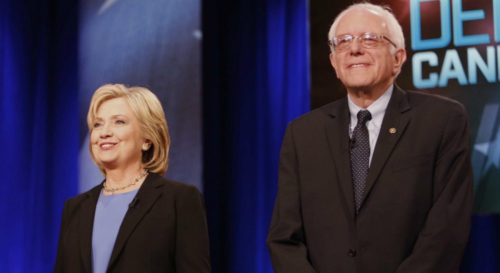 Steve Almond, a Bernie Sanders supporter, pens an open letter to his wife, who supports Hillary Clinton. In this photo, Clinton and Sanders stand together before the start of the NBC, YouTube Democratic presidential debate at the Gaillard Center, Sunday, Jan. 17, 2016, in Charleston, S.C. (Mic Smith/ AP)